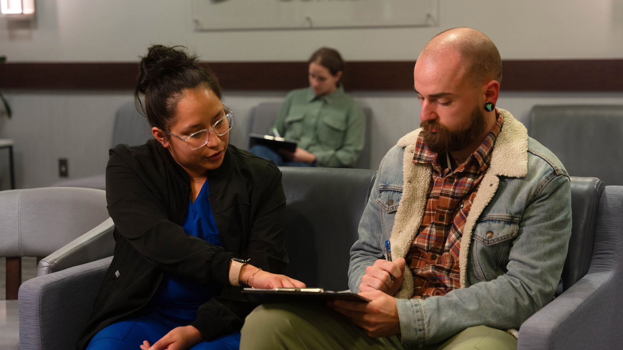 fallbrook family provider reviewing document with patient